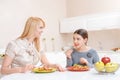 Mother and daughter have lunch Royalty Free Stock Photo