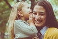 Mother and daughter have play together.