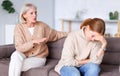 Mother and daughter having argument on sofa Royalty Free Stock Photo