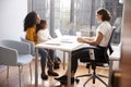 Mother And Daughter Having Consultation With Female Pediatrician In Hospital Office Royalty Free Stock Photo