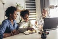 Mother And Daughter Having Consultation With Male Pediatrician In Hospital Office Royalty Free Stock Photo