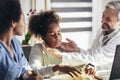 Mother And Daughter Having Consultation With Male Pediatrician In Hospital Office Royalty Free Stock Photo