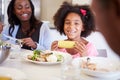 Mother And Daughter Having Family Meal At Table Royalty Free Stock Photo