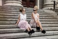 Mother and daughter having fun in same outfits wearing tutu skirts