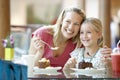 Mother And Daughter Having Lunch Together At Cafe Royalty Free Stock Photo