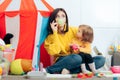 Mother and Daughter Having a Tea Party Role Play Game Royalty Free Stock Photo