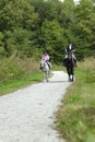 Mother Daughter horse ride Royalty Free Stock Photo