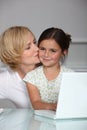 Mother and daughter at laptop