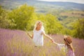 Mother and daughter in lavender field