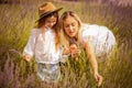 Mother and daughter in lavender field