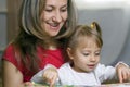 Mother And Daughter Learning At Home