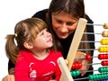 Mother and daughter learning math with abacus