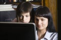 Mother And Daughter Looking At Computer Screen Royalty Free Stock Photo