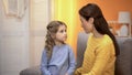 Mother and daughter looking at each other with love, support and care, emotions Royalty Free Stock Photo