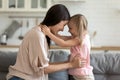 Mother daughter looking at each other touch foreheads feeling love Royalty Free Stock Photo