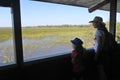 Mother and daughter looking a the landscape view of Wetland swamp Kakadu National Park Northern Territory Australia Royalty Free Stock Photo