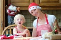 Mother and daughter making chrtistmas cookies Royalty Free Stock Photo