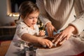 mother and daughter making gingerbread at home Royalty Free Stock Photo