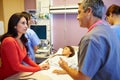 Mother And Daughter With Medical Staff In Hospital Room Royalty Free Stock Photo