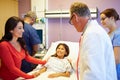 Mother And Daughter With Medical Staff In Hospital Room Royalty Free Stock Photo