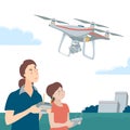 Mother and daughter playing with drone in the park Royalty Free Stock Photo