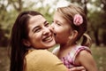 Mother and daughter outdoors in a meadow. Royalty Free Stock Photo