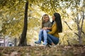 Mother and daughter outdoors in a meadow. Royalty Free Stock Photo