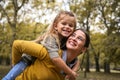 Mother and daughter outdoors in a meadow. Royalty Free Stock Photo