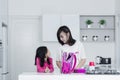 Mother and daughter packing lunch in the kitchen Royalty Free Stock Photo