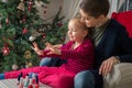 Mother and daughter painting finger nails on xmas day Royalty Free Stock Photo