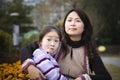 Mother and daughter in park