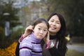 Mother and daughter in park