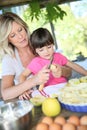 Mother and daughter peeling apples Royalty Free Stock Photo