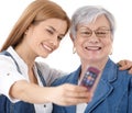 Mother and daughter photographing themselves