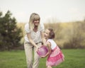 Mother and daughter playing with ball in the park Royalty Free Stock Photo