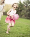 Mother and daughter playing with ball in the park Royalty Free Stock Photo