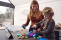 Mother With Daughter Playing With Engineering Construction Kit Together At Home Royalty Free Stock Photo