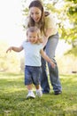 Mother and daughter playing outdoors