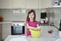 Mother and daughter playing and preparing dough in the kitchen Royalty Free Stock Photo