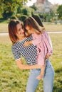 Mother with daughter playing in a summer park Royalty Free Stock Photo