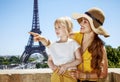 Mother and daughter pointing on something. Paris, France Royalty Free Stock Photo