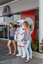 Mother and daughter posing with astronaut at Kennedy Space Center Visitor Complex in Cape Canaveral Florida USA Royalty Free Stock Photo