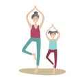 Mother and daughter practicing yoga standing on one leg. Family Sports and physical activity with children, joint active