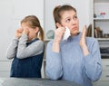 Mother and daughter after a quarrel went their separate ways Royalty Free Stock Photo