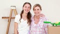 Mother and daughter redecorating together