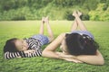 Mother and daughter relaxing in the meadow Royalty Free Stock Photo