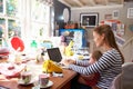 Mother With Daughter Running Small Business From Home Office Royalty Free Stock Photo