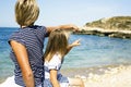 mother with daughter at sea cost together, happy real family smi Royalty Free Stock Photo