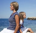 Mother with daughter at sea cost together, happy real family smiling looking to horizont, lifestyle people concept, on Royalty Free Stock Photo