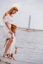 Mother and daughter at seashore Royalty Free Stock Photo